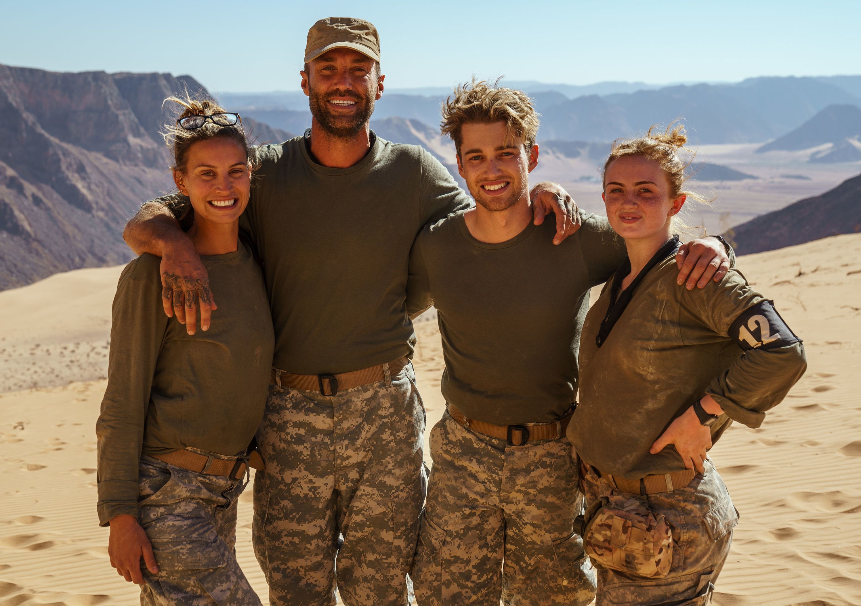 Four celebrities in military fatigues who completed the Celebrity SAS: Who Dares Wins course.